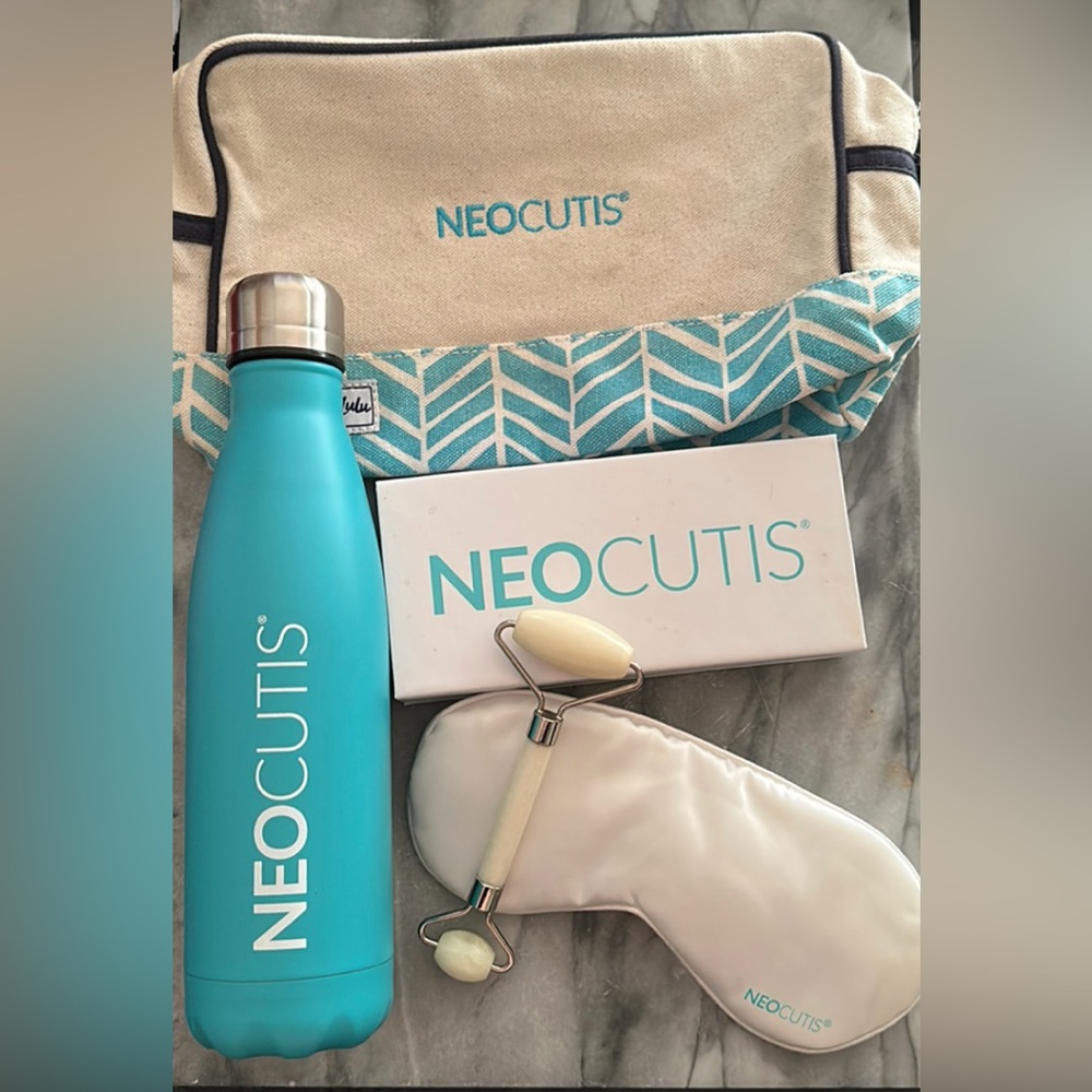 Neocutis Swag NeoCutis Sleep Mask, Water Bottle, Travel bag and Skincare Roller